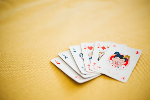 Closeup shot of playing cards on the table - perfect for a cool wallpaper or background - Fotoğraf, Görsel