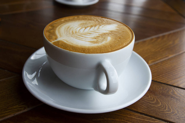 A large mug of flavored cappuccino. - Φωτογραφία, εικόνα