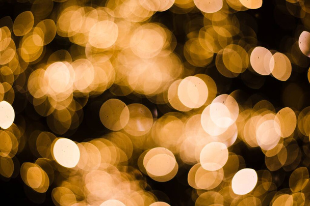 Horizontal shot of beautiful bokeh lights - perfect for a lit background - 写真・画像