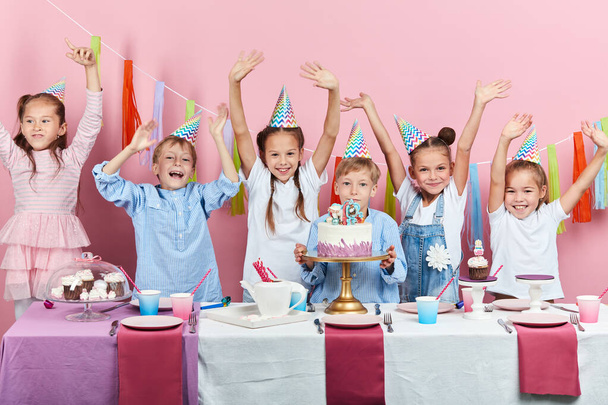 awesome children having a birthday party - Фото, изображение