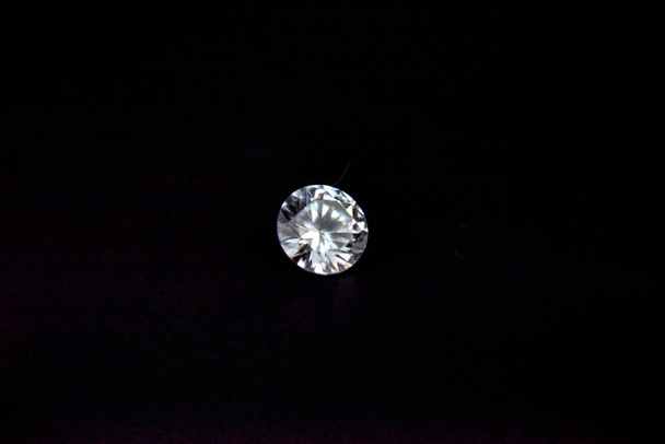 one diamond of classic shape on the black background - 写真・画像