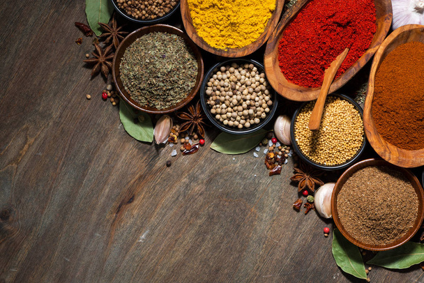 assortment of various spices on a wooden table - Φωτογραφία, εικόνα
