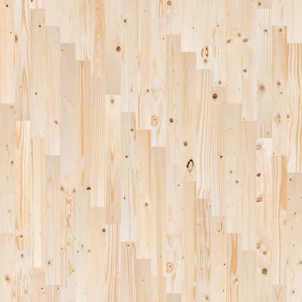 Een fragment van een houten parketvloer van een naaldplank. - Foto, afbeelding