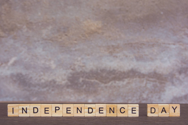 Independence day text with alphabet wooden block cube on table d - Photo, Image