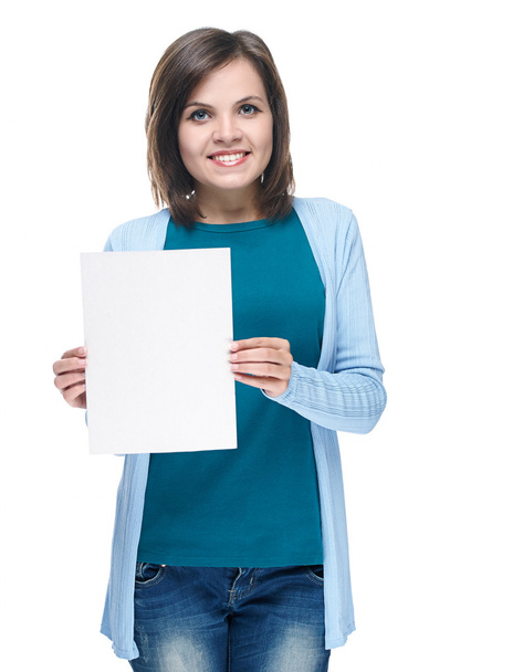 Attractive young woman in a blue shirt. Holds a poster. - Photo, image
