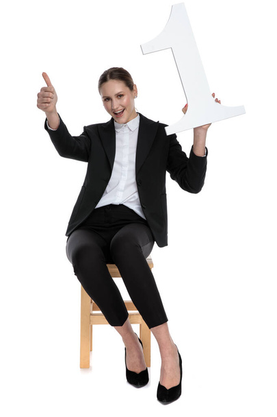 businesswoman showing a number one and making ok sign - Photo, Image