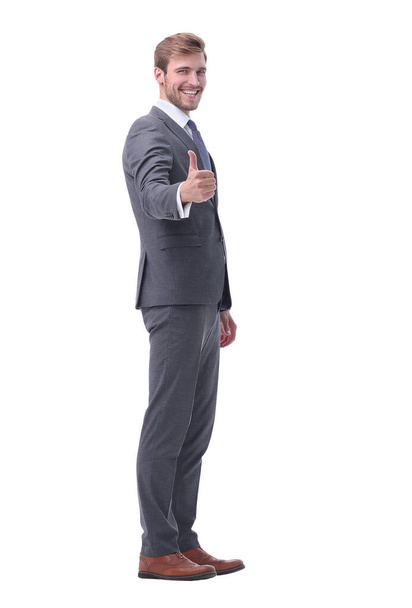 in full growth. happy businessman showing thumbs up. - Foto, Imagem