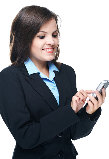 Attractive young woman in a black jacket. Holding a mobile phone - Foto, Imagem