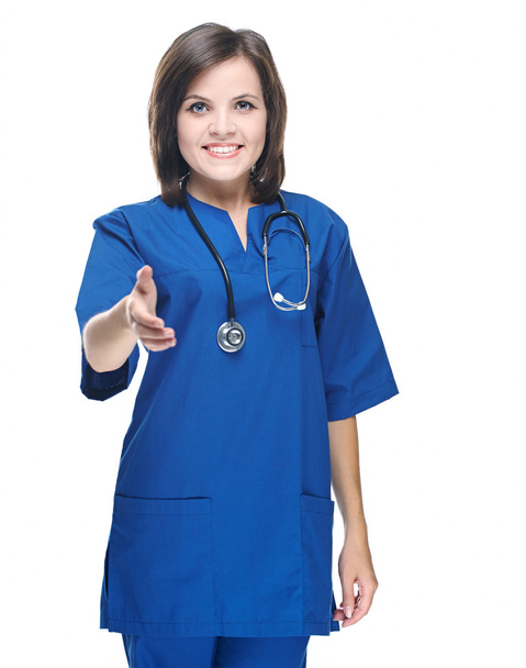 Привлекательная молодая медсестра в форме. Пожать руку за рукопожатие
 - Фото, изображение