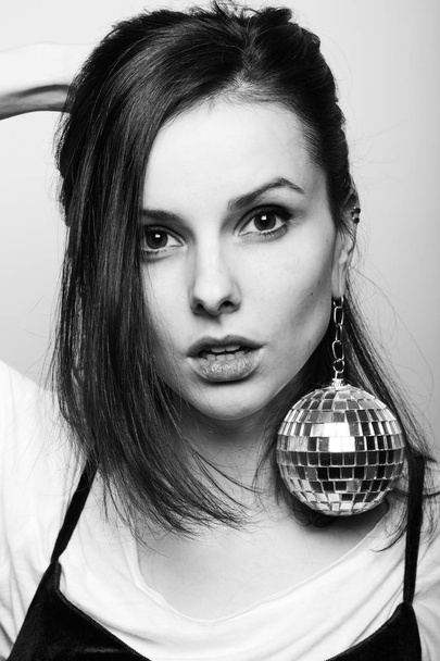 young woman with disco ball black white photography - Фото, изображение