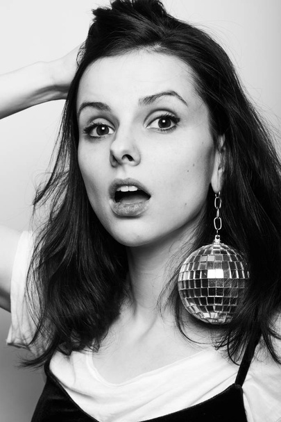 young woman with disco ball black white photography - Zdjęcie, obraz