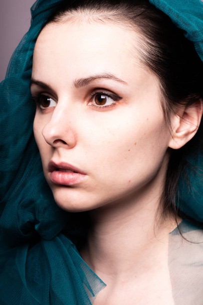 Young woman, blue color material - Fotografie, Obrázek