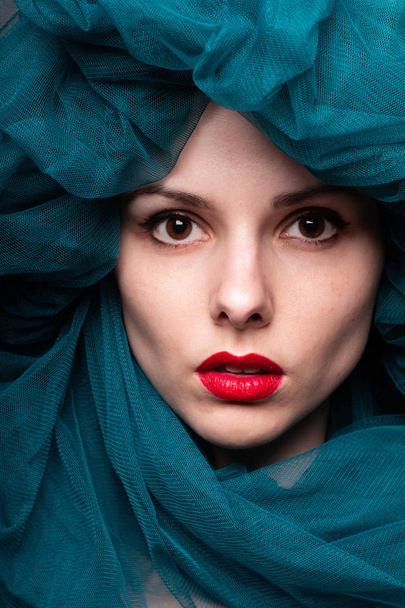 Young woman with red lipstick on her lips - Foto, imagen