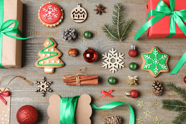 Flat lay composition with Christmas gifts on wooden background - Zdjęcie, obraz