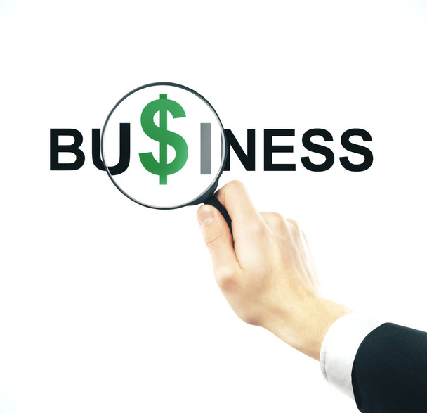 Επιχειρηματίας κοιτάζει ένα σύμβολο δολαρίου - Φωτογραφία, εικόνα