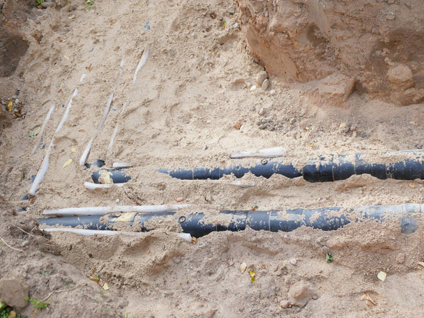 dug pipes. Dug pipes. For repair at a construction site. communication wiring to the house - Photo, Image
