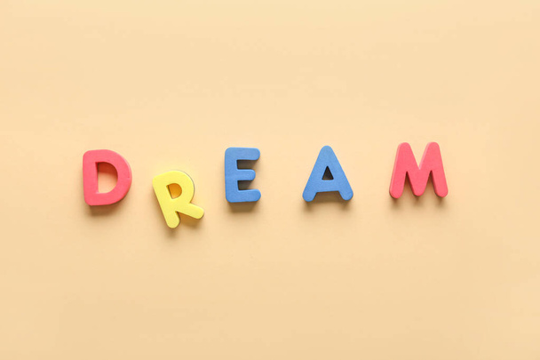 Word DREAM on color background - Foto, afbeelding