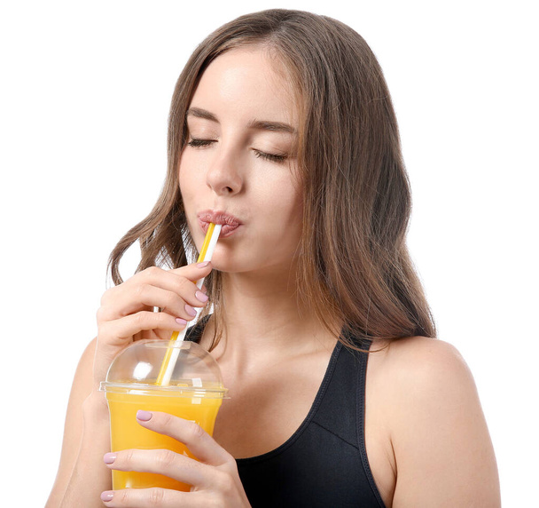 Красива молода жінка з апельсиновим соком на білому тлі
 - Фото, зображення