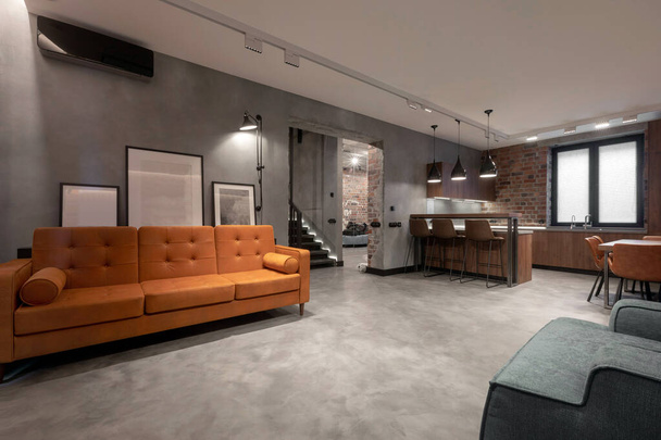 Cozy interior design of contemporary light spacious studio apartment - Photo, Image