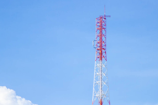 Communication tower transmission  with blue sky background  - Photo, Image