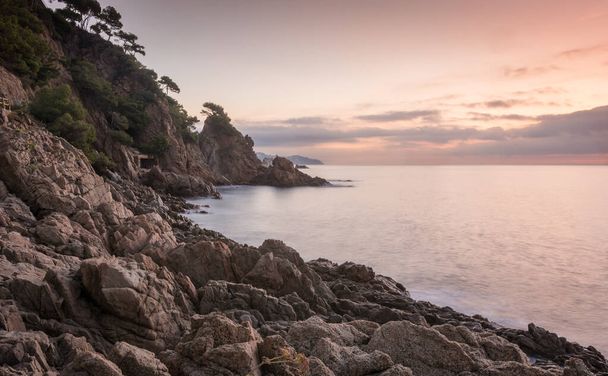 Sunrise on the beach of Blanes in the heart of Costa Brava in Spain. - Foto, afbeelding