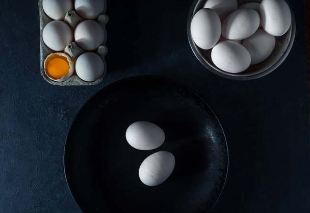 fresh chicken eggs on dark background - Foto, immagini