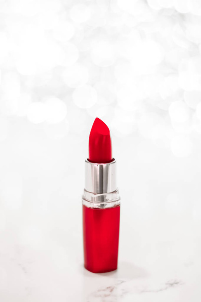 Red lipstick on silver Christmas, New Years and Valentines Day h - Φωτογραφία, εικόνα