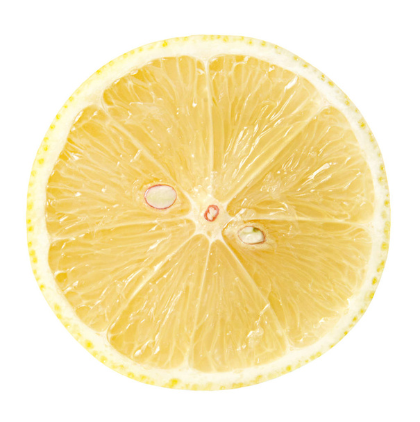 Lemon in cross section on a white isolated background. Good texture and shape. Clipping path. - Foto, afbeelding