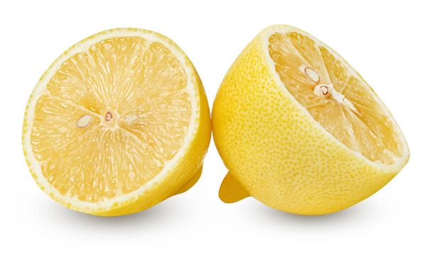 Two halves of a lemon on a white isolated background. Good texture and shape. Clipping path. - Zdjęcie, obraz