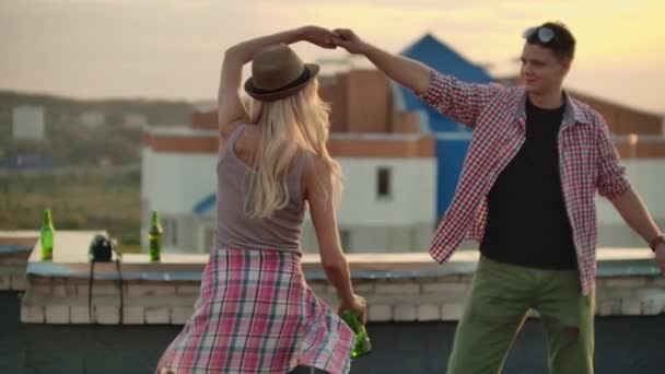 Loving couple is dancing on the roof - Felvétel, videó