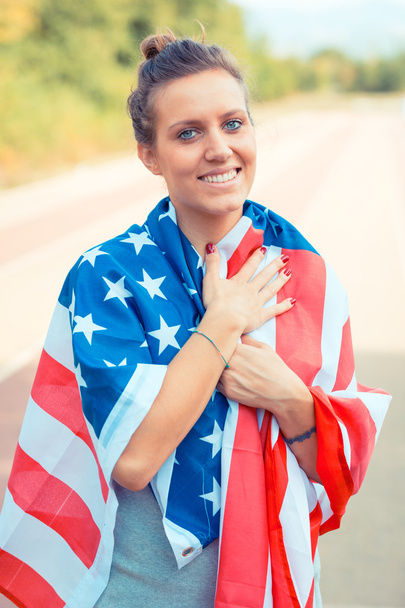 Beautiful Young Woman with USA Flag - Fotó, kép