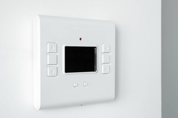 Modern programmable thermostat water heater (boiler) for setting the room temperature. Smart home. - Photo, Image