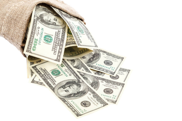 Bankovky peníze dolary v tašce na bílém pozadí. - Fotografie, Obrázek