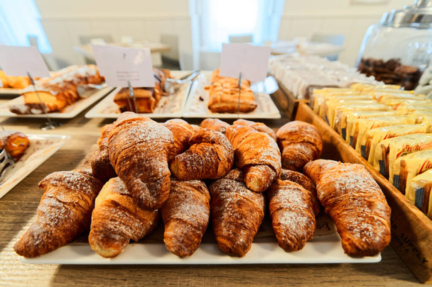 Sweet french croissants pastry with jam and cream - Fotografie, Obrázek