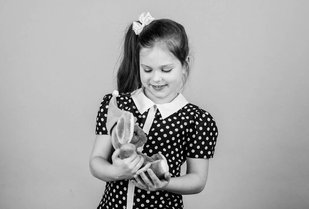 Spreading love. Kid cute girl play with soft toy mouse. Happy childhood. Child care. Sweet childhood. Childhood concept. Lovely small girl with favorite toy. Kindergarten and educational games - Foto, Imagen