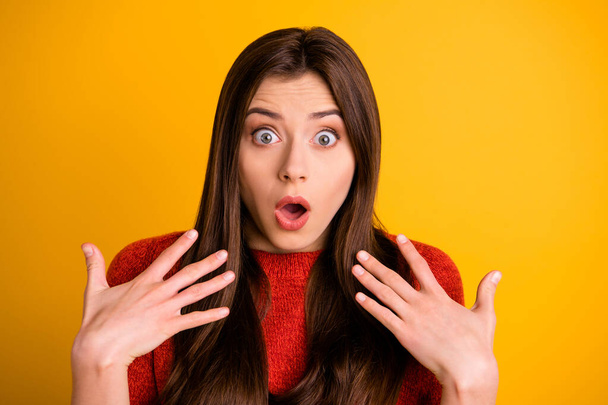 Close up photo of lovely mad crazy youngster showing you her nails with shocked face offended isolated over yellow vivid color background - 写真・画像