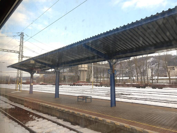 Empty railway station in city at winter - Photo, Image