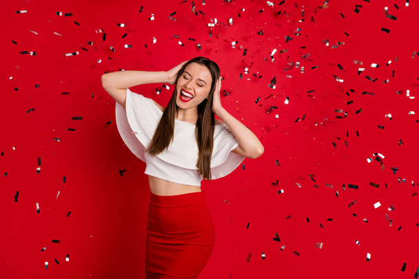 Portrait of her she nice-looking attractive lovely gorgeous feminine cheerful cheery positive lady having fun time disco isolated on bright vivid shine red background - Photo, Image