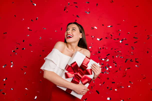Portrait of her she nice-looking attractive lovely pretty adorable smart lovable fascinating cheerful cheery glad lady holding in hands romance box isolated on bright vivid shine red background - Φωτογραφία, εικόνα