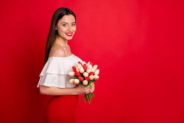Portrait of lovely people holding fresh natural gift for 8-march 14-february smiling isolated over red background - Φωτογραφία, εικόνα