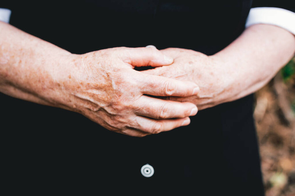 Older woman hands holding each other. Elderly people concept - Fotoğraf, Görsel