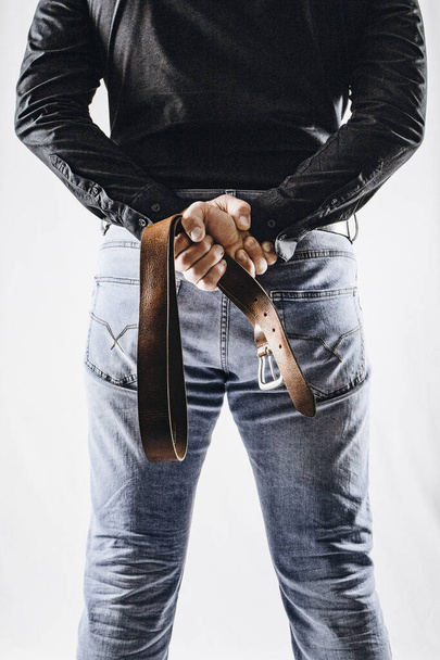 Man with belt. BDSM concept. - Photo, Image