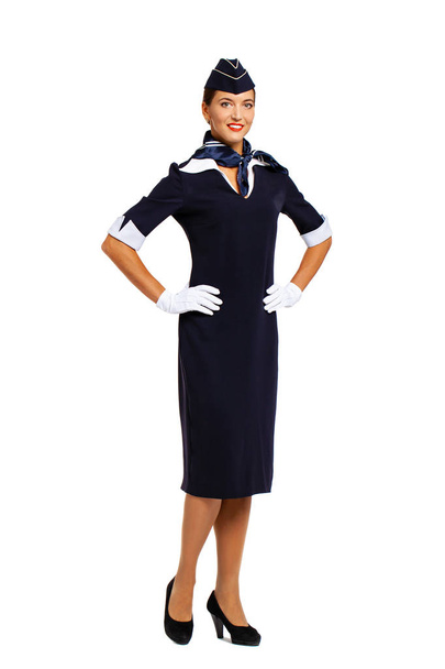 Young beautiful Russian stewardess in blue uniform  - Φωτογραφία, εικόνα