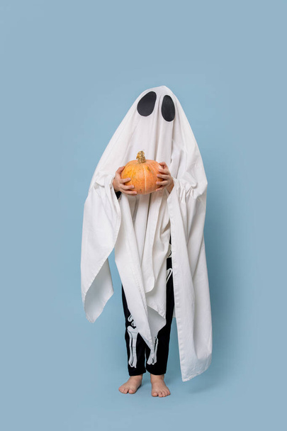 ghost with a pumpkin in his hands - 写真・画像