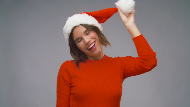 woman in santa helper hat having fun on christmas - Video