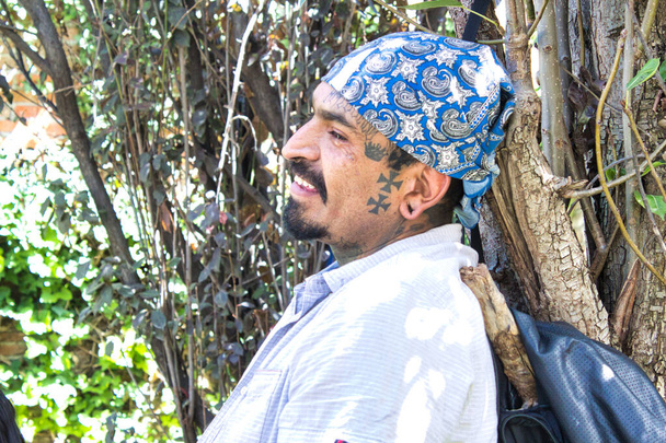 Latin man tattooed during shamanic, pre-Hispanic ritual - 写真・画像
