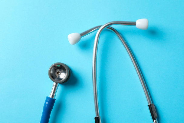 Stethoscope on blue background, top view and space for text - Φωτογραφία, εικόνα