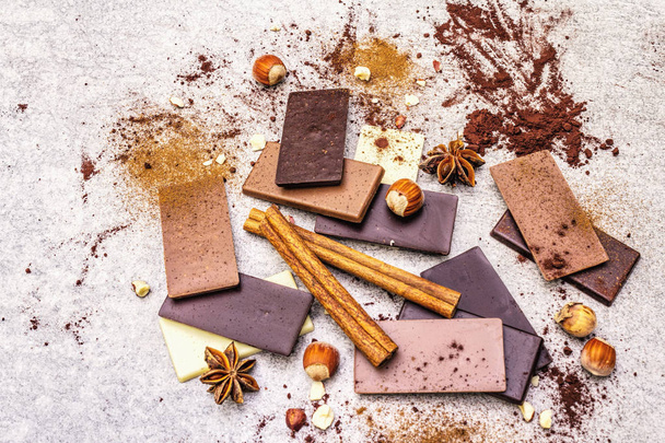 Assorted chocolate with different cocoa content - Фото, зображення
