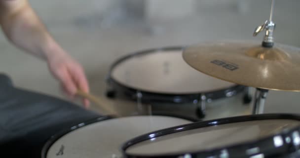 Man playing the Drumset, hand view, grey design concept - Záběry, video