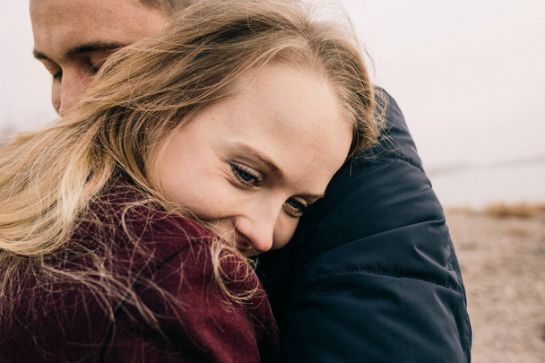 couple hugging on a pier - Foto, Imagen